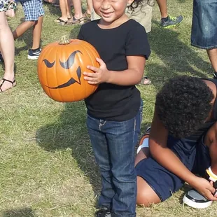 My daughter and her pumpkin bowling ball