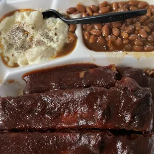 Spicy ribs, potato salad, barbecue beans