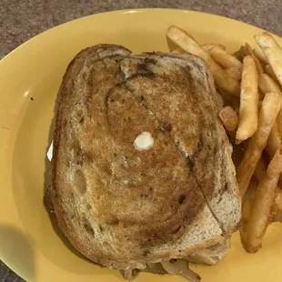 Patty melt on rye bread with crispy hot fries !