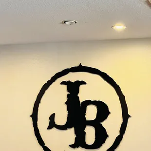 the logo on the wall of the restaurant