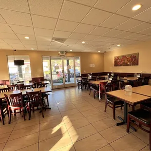 dining area with tables and chairs