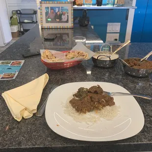 Goat and perfectly cooked jasmine rice and garlic naan! My favorite! The Chicken Tikka Masala is a close second! You need to try! Yum!