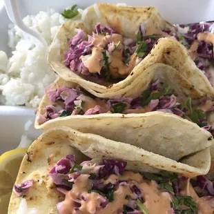 3 Mahi-mahi fish tacos with a side of jasmine rice$11