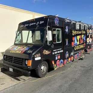 a food truck parked in a parking lot