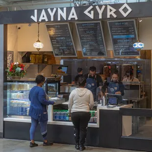 Customers buying the best greek food
