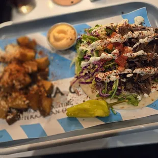 Lamb and beef gyro with Greek fries added feta