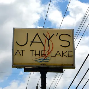 a sign for jay's at the lake