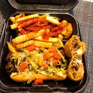 &quot;Obama&quot; Jerk Philly cheesesteak with a Jerk Chicken egg roll and a side of fries with mild sauce.