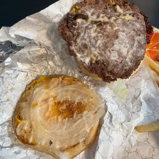 Below the burger - onions and Jay's sauce