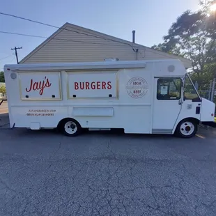 a food truck parked in front of a house