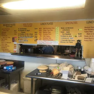 menus on the wall of the restaurant