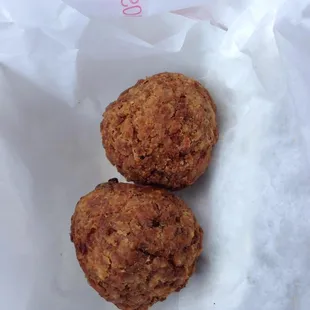 Boudin balls-- crunchy on the outside, almost creamy on the inside, fried balls of sausage and rice.