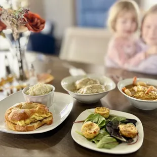 Croissant sandwich w/grits, biscuits &amp; gravy, shrimp &amp; grits, egg bites