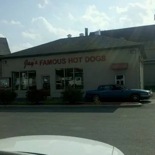 a car parked in front of a building