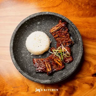 a plate of food on a wooden table