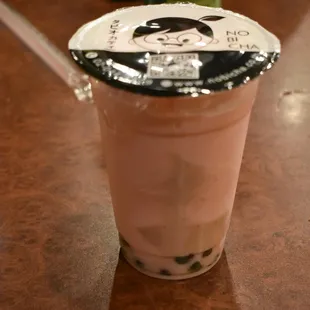 a drink in a plastic cup