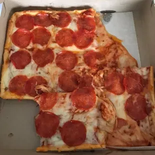 a slice of pepperoni pizza