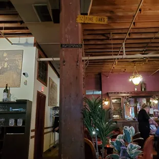 I love the coat hooks on the beams