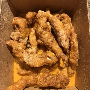Boneless gluten free chicken wings in garlic sauce