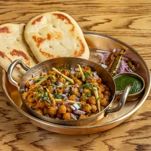 LOTAN KE CHOLE

masala chickpeas, kulcha bread. (chawri bazar's legendary lotan's chole, served in old Delhi for over a hundred years.)