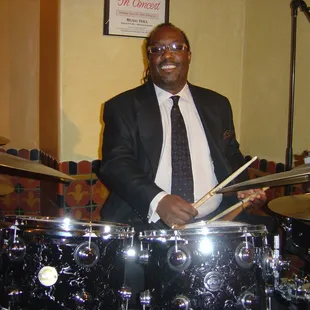 a man playing drums