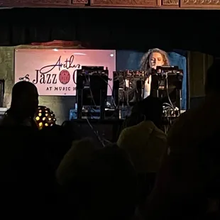 Sillygirlcarmen DJing during a house music event