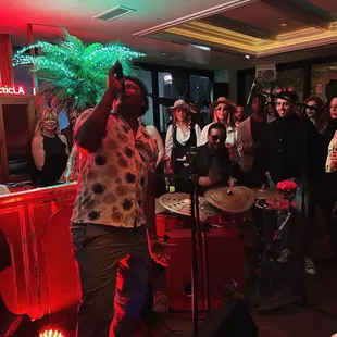 a group of people in a bar