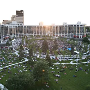 a large crowd of people in a park
