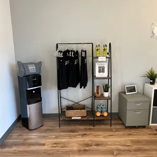 Merchandising area as well as complimentary water station to fill your water bottles