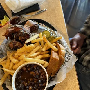 Garlic Parmesan wings, brisket, fries and Miles Davis baked beans