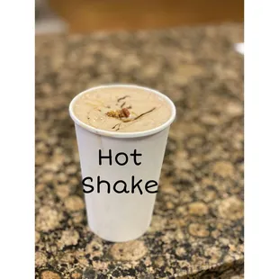 a hot shake in a paper cup