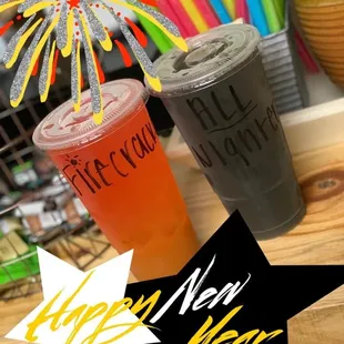 two drinks with fireworks in the background