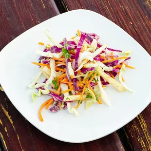 Chef Inspired Slaw ~ Cabbage, Gorgonzola Cheese, Red Bell Pepper, Carrots, Cilantro, Parsley with a Creole Vinaigrette