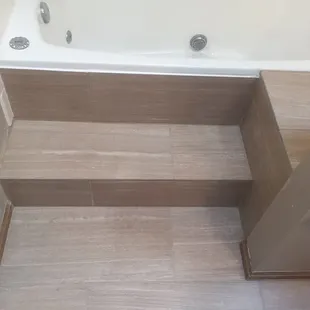 a view of a bathroom with a bathtub
