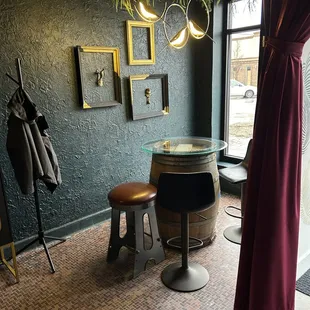 a wine barrel table and stool