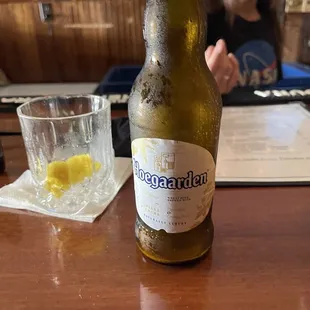 a bottle of beer on a table