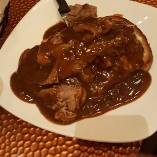 Hot beef sandwich on texas toast. This roast beef comes from the unused prime rib from the steakhouse and it is good!