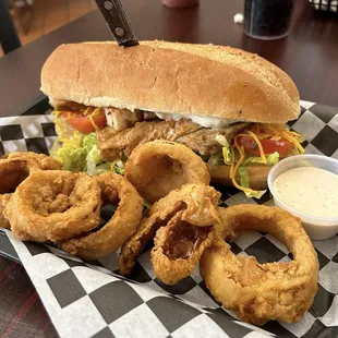 Pork belly BLT with a side of onion rings