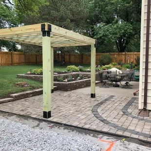 Wood pergola with paver patio in Crete, NE.