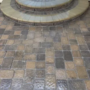 Paver patio leading to two levels of stairs before entering home in Lincoln, NE.