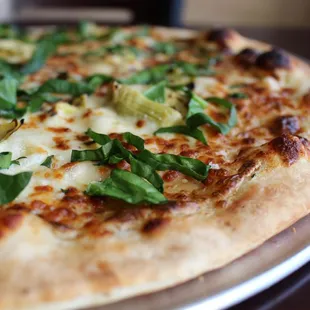 Vegetarian-friendly Spinach and Artichoke Pizza