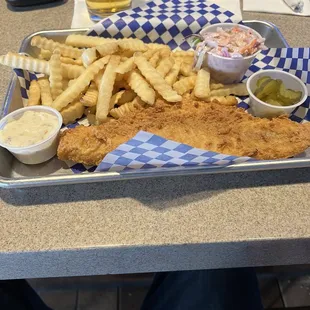 (Friday?) fish fry. Haddock I believe. Fries and slaw. Good size portion of fish, not overly battered. Pretty solid.