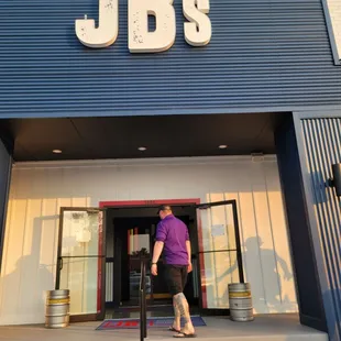 a man entering the store