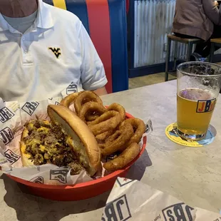Phillie Cheesesteak and onion rings