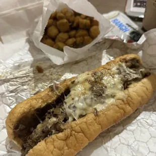 Beef Cheesesteak Sandwich with mushrooms and fried okra