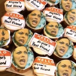 a bunch of cupcakes with the faces of president obama