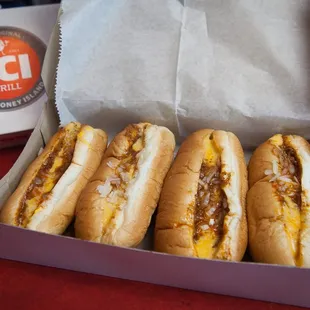  four hot dogs in a box