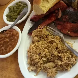 Three meat/three side platter: pulled pork, brisket, sausage, baked beans, green beans, &amp; corn