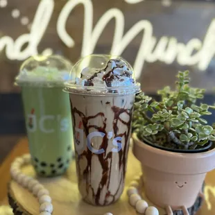 two cups of boba milkshake