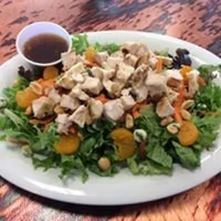 This is a delicious Oriental salad we serve at lunch!  The Wasabi Peas make it off the chart!